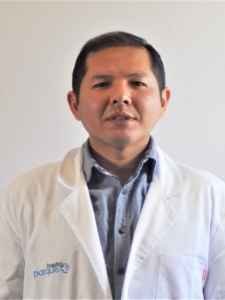 Dr Christian Marquínez